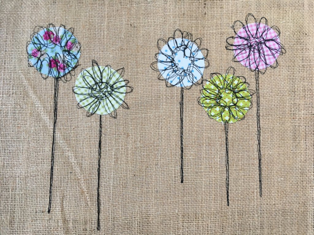 Embroidered flowers by Jean Tinsley