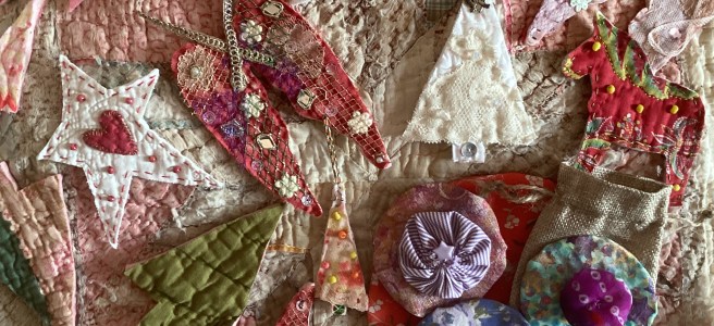 A selection of Christmas Decorations made with decorative vintage fabrics by Kath Price
