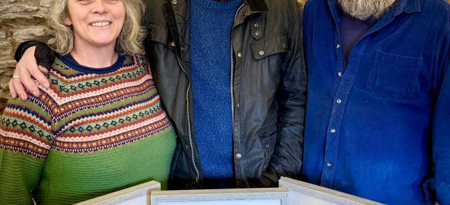 Carolyn and David Asquith with local artist Gordon Lamb, on the right