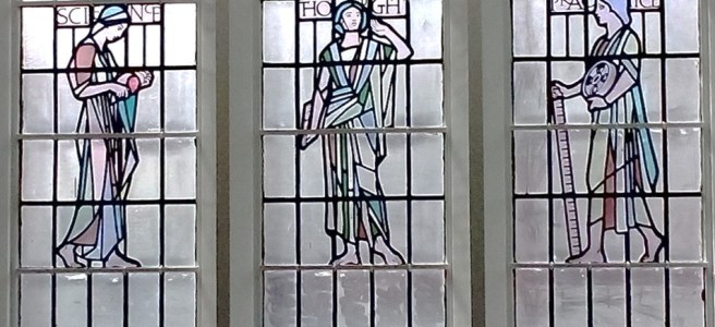 A three panel stained glass window by George Hatton at Newcastle University